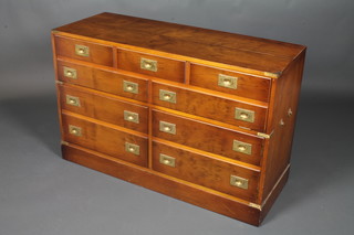 A Military style yew chest fitted a fall front above double cupboards and 9 dummy drawers, 28"h x 45"w x 17"d