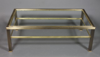 A rectangular polished metal coffee table 16"h x 47"w x 27"d