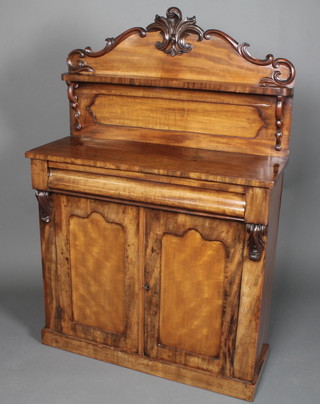 A Victorian mahogany chiffonier, the raised back fitted a shelf above 1 long drawer, the base fitted a cupboard enclosed by  panelled doors on a platform base 54"h x 36"w x 13.5"d