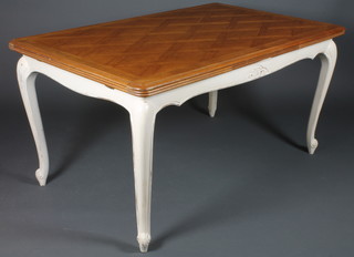 A French oak and white painted drawleaf dining table the top  with parquetry decoration raised on cabriole supports 30"h x  58"w x 37"d