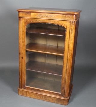 A Victorian inlaid walnut D shaped music cabinet, fitted shelves enclosed by a glazed panelled door 46"h x 16"w x 29"d