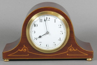 A French timepiece with enamelled dial and Arabic numerals contained in an Admiral's hat shaped inlaid mahogany case