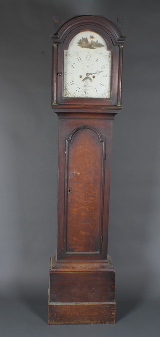 Cragg, Horsham. A late 18th Century oak longcase clock, the case with fluted pilasters to hood above an arched top trunk door  with box base below, set 12" broken arch painted dial, Arabic  dial with date aperture and second subsidiary dial, having an 8  day 2 train anchor movement, striking bell, 82"h x 18"w x 10"d