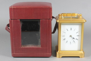 A 19th/20th Century French 8 day chiming carriage clock with enamelled dial and Roman numerals 5", complete with leather  travelling case  ILLUSTRATED