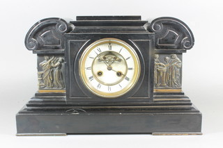 A Victorian French 8 day mantel clock with porcelain dial,  Roman numerals and visible escapement, contained in a black  marble architectural case