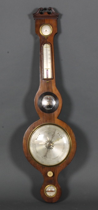 A Georgian mercury wheel barometer and thermometer with silvered dial, mirror, damp/dry indicator and spirit level