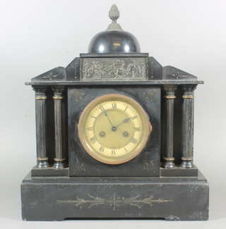 A Victorian French 8 day mantel clock with paper dial and  Roman numerals contained in a black marble architectural case