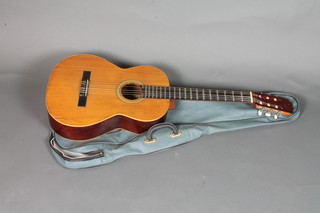 A modern Spanish 6 string acoustic guitar labelled Alhambra.SA