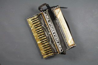 An Italian Paolo Noprani accordion marked C Fidardo with 120 buttons