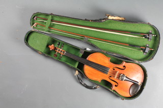 A violin with 2 piece back 14.5" together with 2 bows and a fibre carrying case