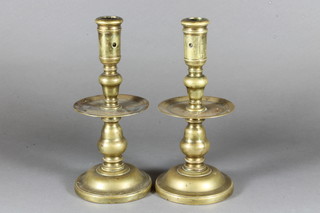 A pair of 17th Century style brass candlesticks 10"