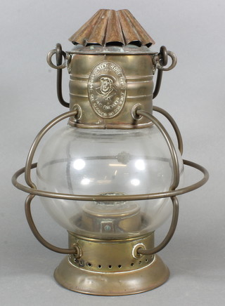 A circular glass and brass Lucas patent globe hanging lantern  marked Tom Bowling