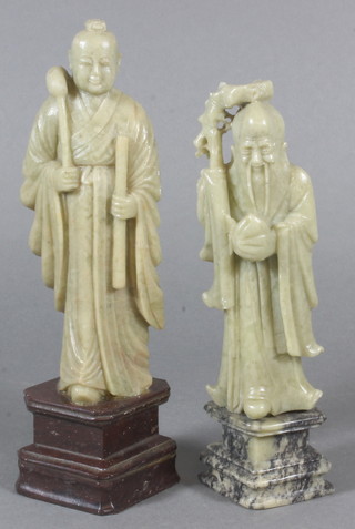 2 Chinese carved soap stone figures of deities 7" and 6"