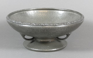 An Art Nouveau Liberty's circular planished pewter, raised on a spreading foot, the base marked Tudric pewter 013449 8"