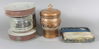 An Art Nouveau cylindrical embossed copper caddy, the base marked Townshends Ltd 7", a reproduction copper mast head  lamp and a Rolls razor