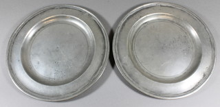 A pair of 18th Century pewter plates, the base marked Arris  London 9.5" diam.