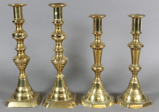 2 pairs of Victorian brass candlesticks with ejectors 9" and 10"