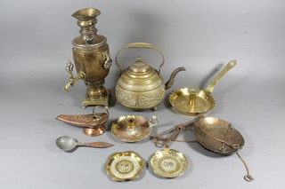 An Eastern engraved brass chamber stick, a tea urn etc
