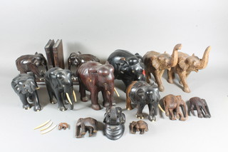 A collection of Ceylonese carved ebony figures of elephants