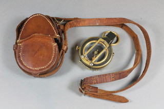 A military WWI prasmatic compass marked F-L No.87909 1917  complete with leather carrying case