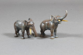 A pair of bronze figures of elephants 1"