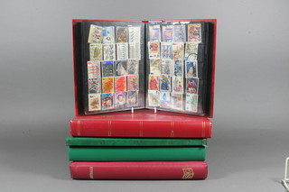 A Stanley Gibbons stamp album - Commonwealth of Australia, 2  green stock books and 2 red stock books
