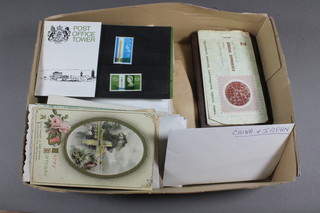A small collection of various stamps and postcards