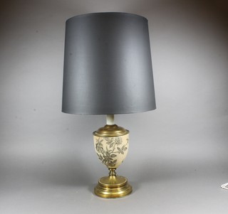A salt glazed and gilt mounted oil lamp reservoir converted to a table lamp