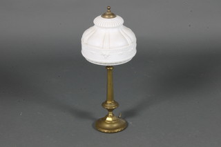 An Art Nouveau gilt metal table lamp with white glass shade 19"