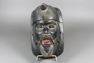 A Portuguese carved mask 12"