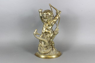 A brass door stop in the form of a cherub encountering a serpent 15"