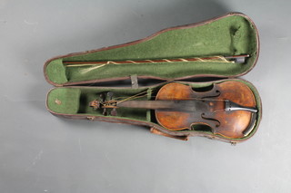 A 19th/20th Century French violin, the reverse marked and sealed Norman Duke London, the interior labelled A74, with  14.5" back together with a fibre carrying case
