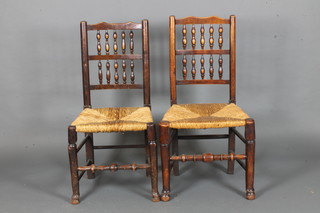 A set of 7 elm spindle back chairs with woven rush seats