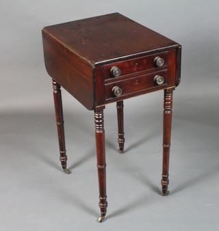 A George IV mahogany Pembroke table of small proportions  fitted 2 end drawers with 2 opposing faux fronted drawers, raised  on ringed turned and collared tapered legs with brass caps and  casters, 29"h x 30"w x 20"d