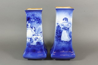 A pair of square Royal Doulton Flo Bleu vases decorated figures  of children 10"