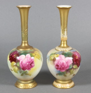 A pair of Royal Worcester specimen vases decorated flowers,  the base with purple Worcester mark and 1661   ILLUSTRATED