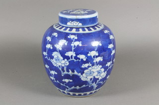A 19th/20th Century Chinese blue and white ginger jar and cover 8", lid cracked, having a 6 character mark to the base