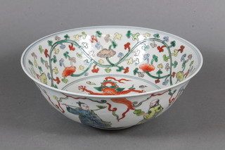 A famille vert porcelain bowl decorated a dragon, the base with 6 character mark 8"