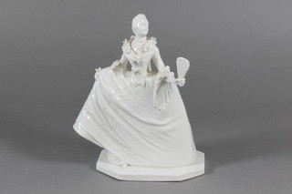 A German blanc de chine porcelain figure of a standing lady with  fan, the base impressed 195 7"