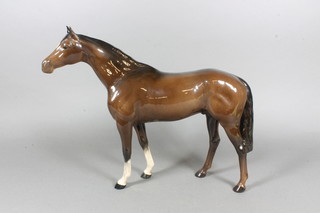 A Beswick figure of a standing bay stallion 12"