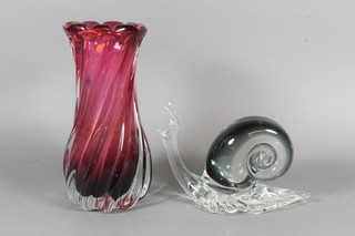 A glass ornament in the form of a snail 6" and a heavy red Art  Glass vase 9"