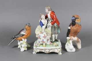 2 Goebel figures of birds 7" and 5" and a porcelain figure group of a standing couple 7"