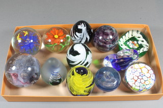 12 various glass paperweights