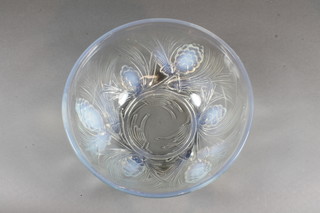 A Lalique style circular glass bowl decorated cones, the base  marked RD No. 777133 8.5" diam.