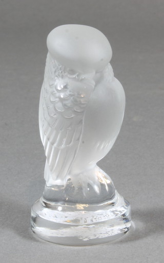 A Lalique paperweight in the form of a seated bird, base marked Lalique France 3.5"  ILLUSTRATED