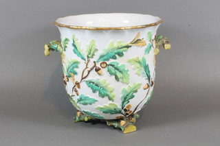 A 19th Century pottery twin handled jardiniere decorated oak  leaves, chipped and foot f, 9"