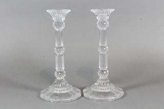 A pair of pressed glass candlesticks 8.5"
