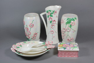 A pair of Malingware cylindrical pink glazed vases with floral decoration 8.5", do. bowl with floral decoration 11", dish 8",  pair of salad servers, jug 6NR - with chip to base 10" and  rectangular trinket box 5"