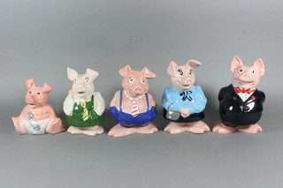 A set of 5 Wade Natwest Piggy banks