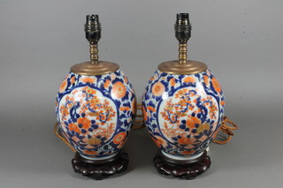 A pair of 19th/20th Century Japanese Imari porcelain vases converted to table lamps 9"
